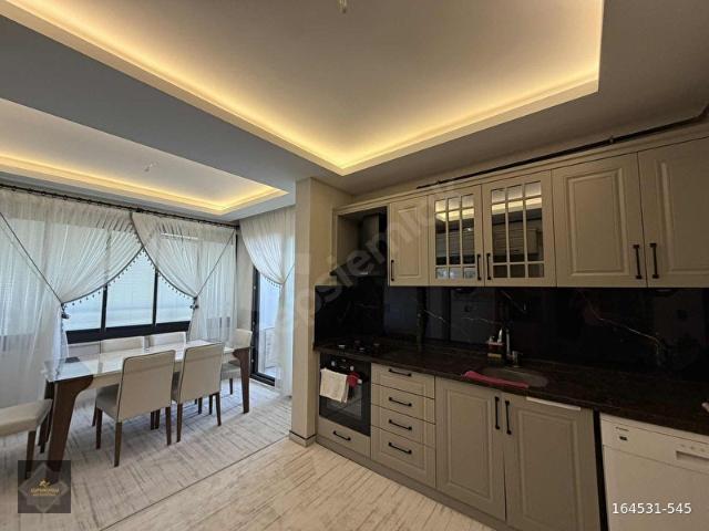 MAVİKENT'TE BAKIMLI GİRİŞ KAT 2.5+1 LÜKS DAİRE