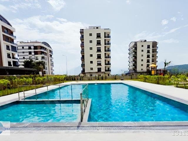 MAZIDAĞINDA 1+1 YERDEN ISITMA DOĞALGAZLI KLİMALI, HAVUZLU, KAPALI OTOPARKLI, SIFIR DAİRE
