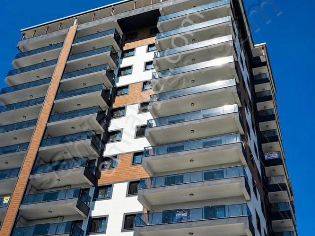 Memenen Uğur Mumcu'da Merkezi Konumda 2+1 Satılık Daire