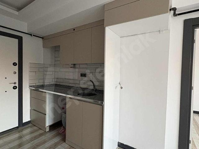 MEMİŞOĞLU EMLAK'TAN KİRALIK ÇARŞIDA 1+1 SIFIR APART