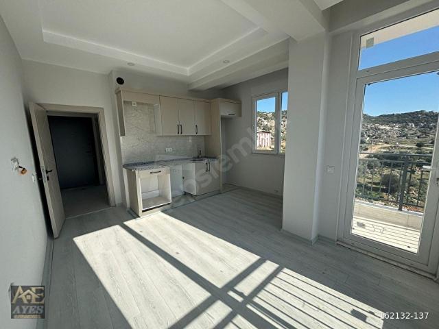 MENDERES MAHALLESİNDE ŞEHİR MANZARALI SATILIK 1+1 DAİRE ASANSÖRLÜ & KREDİYE UYGUN!