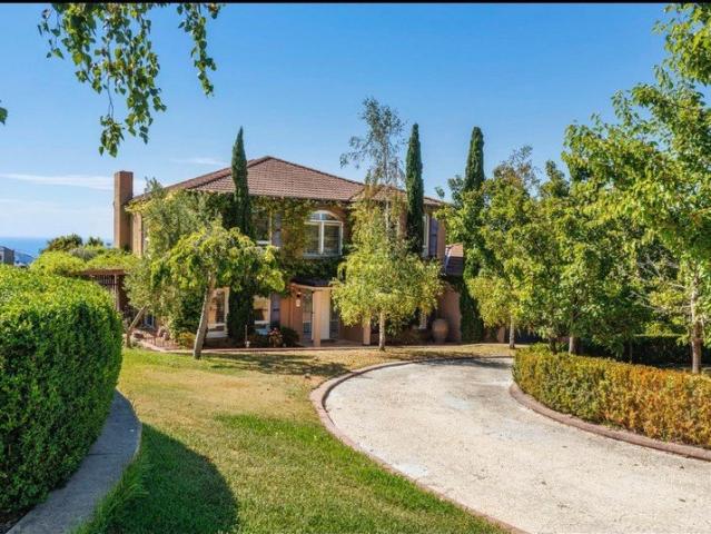Mediterranean Charm with Sweeping Bay Views
