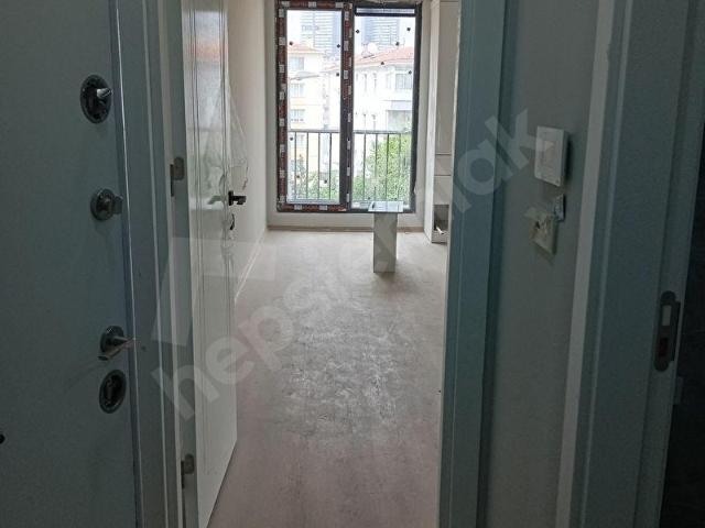MEHMET TELLİOĞLU NDA DİKİLİTAŞ SATILIK SIFIR 1+1 DAİRE