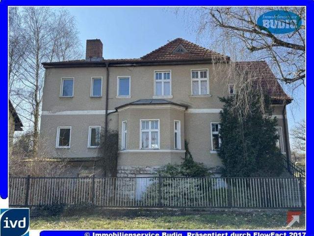 Mehrgenerationenhaus mit Wohnungen, Gewerbe, Werkstatt und Garagen in zentraler Lage
