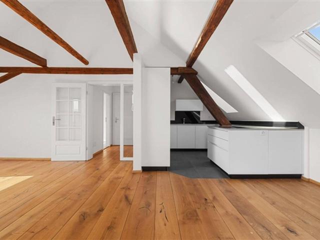 Mehrgeschossige Dachwohnung mit Balkon und fantastischer Aussicht!
