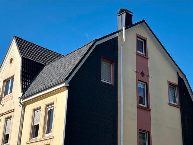 Mehrfamilienhaus mit 4 Wohneinheiten & Garten