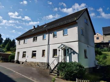 Mehrfamilienhaus mit 3 Wohnungen + 1 Whg Gewerbe im EG