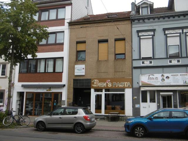 Mehrfamilienhaus mit 3 Wohneinheiten Ladenlokal in Bremen