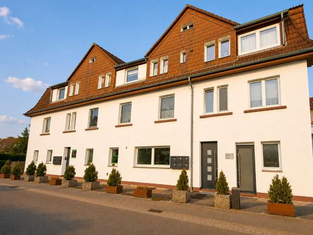 Mehrfamilienhaus mit Wohn und Gewerbeeinheiten