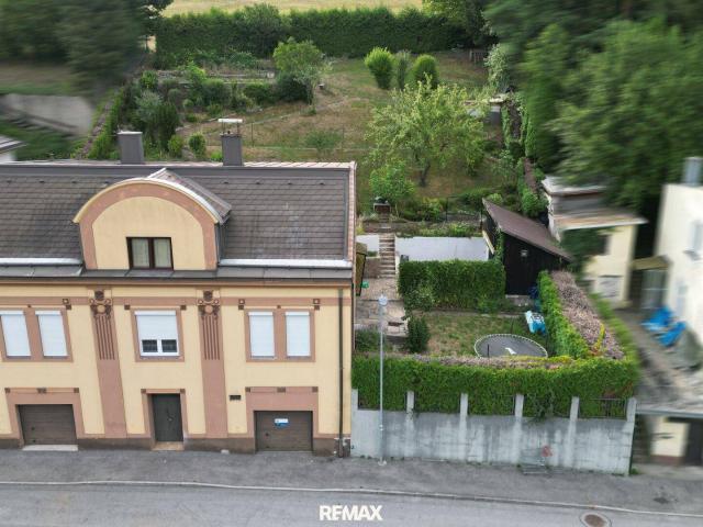 Mehrfamilienhaus mit zwei Wohneinheiten und Garten in Traisen