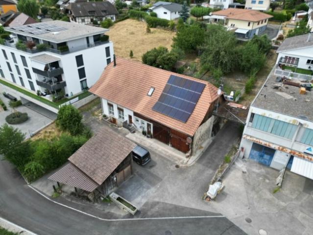 Mehrfamilienhaus mit Bauland an attraktiver Lage