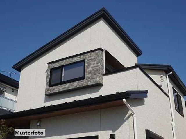 Mehrfamilienhaus mit Doppelgarage