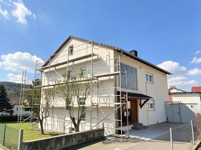 Mehrfamilienhaus mit drei Wohneinheiten und weiterem Baupotenzial