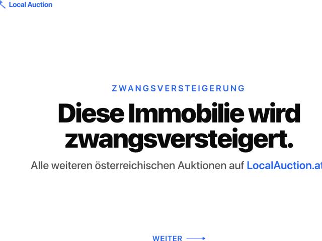 Mehrfamilienhaus mit Garagen