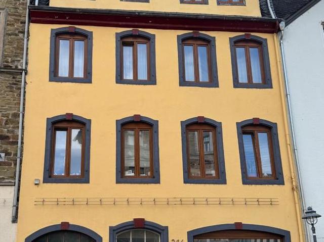 Mehrfamilienhaus mit Ladenlokal – kernsaniert, denkmalgeschützt