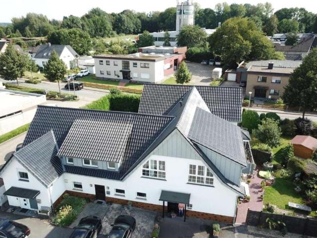 Mehrfamilienhaus & Baugrundstück