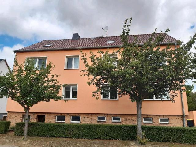 Mehrparteienhaus mit 6 Wohnungen und großzügigem Grundstück