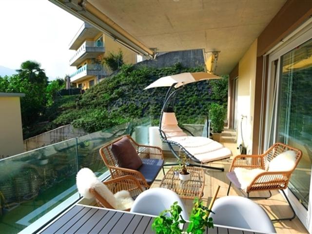 Melide Modernes 4,5 Zimmer Apartment mit teilweisem Seeblick