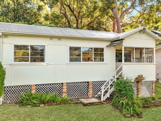 Melody Cottage A Rare Pearl Beach Canvas with Endless Potential!
