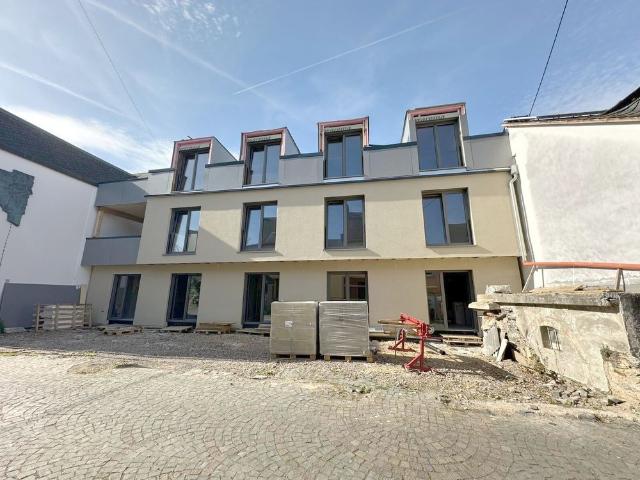 Merhring: Moderne Neubau Erdgeschosswohnung mit eigenem Eingang, Stellplatz und Terrasse