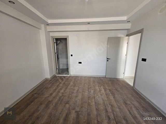 MERKEZ EMLAKTAN KUMLUBELDE YENİ BİNADA ŞIK 2+1 DAİRE!