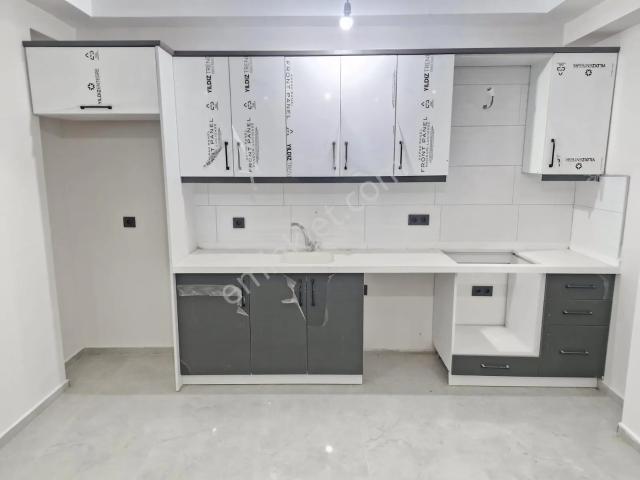 Merkezi Konumda 1+1 Sıfır Kullanışlı Satılık Daire