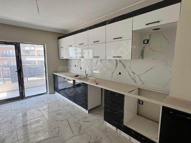 MERKEZİ KONUMDA TÜRKÖZÜ'NDE 3+1 SİTE İÇİNDE SATILIK DAİRE