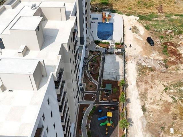 MERSİN TÖMÜK'TE SİTE İÇERİSİNDE 1+1 SATILIK DAİRE 60 m SOSYAL DONATILI YAŞAM