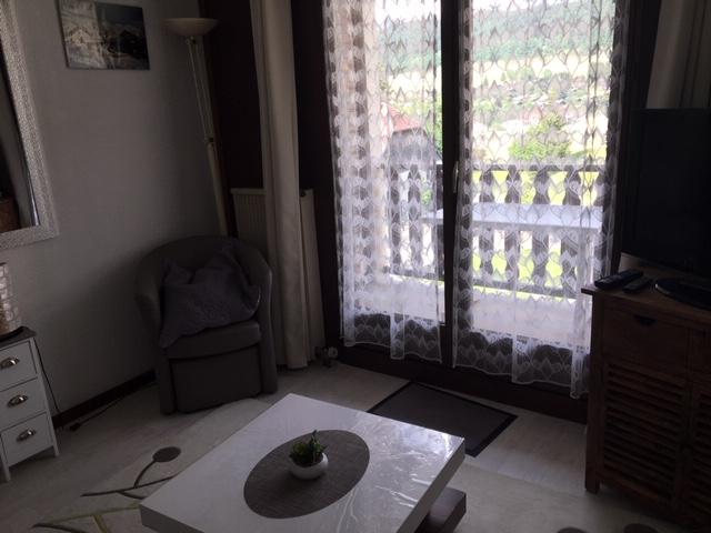 METABIEF bel appartement fonctionnel avec balcon et piscine intérieure chauffée et garage pour VTT