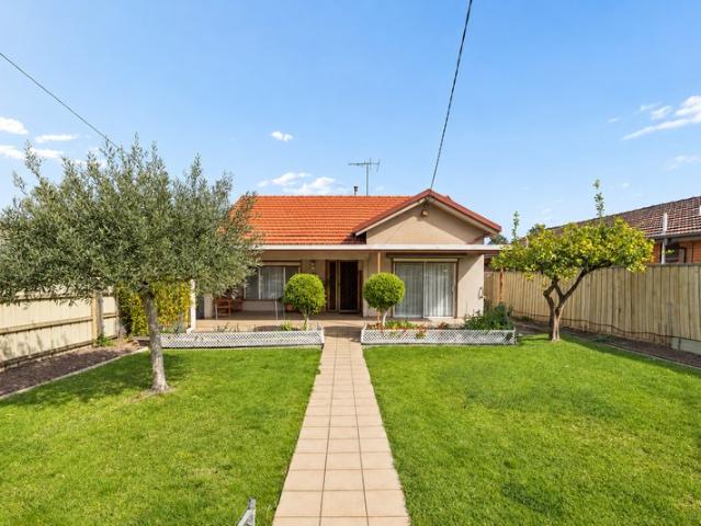 Meticulously Maintained For with Rare Rear Laneway Access & Future Potential