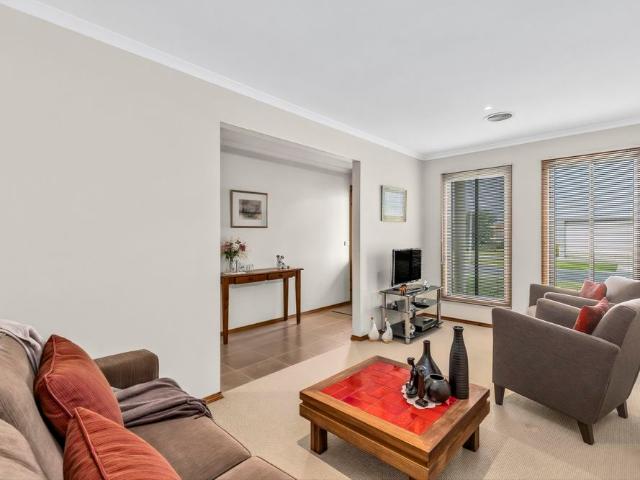 METICULOUSLY PRESENTED THREE BEDROOM, TWO LIVING HOME