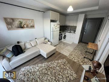 MEZİTLİDE SIFIR, FUL EŞYALI HAVUZLU 1+1 KİRALIK DAİRE