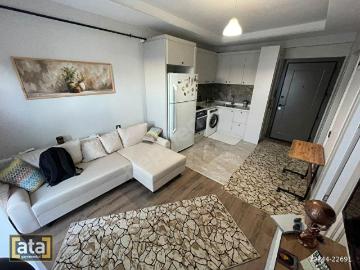 MEZİTLİDE SIFIR, FUL EŞYALI HAVUZLU 1+1 KİRALIK DAİRE