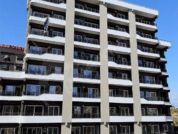MEZİTLİ KİRALIK ANAYOLA YAKIN GENİŞ PEYZAJLI SIFIR 1+1 DAİRE