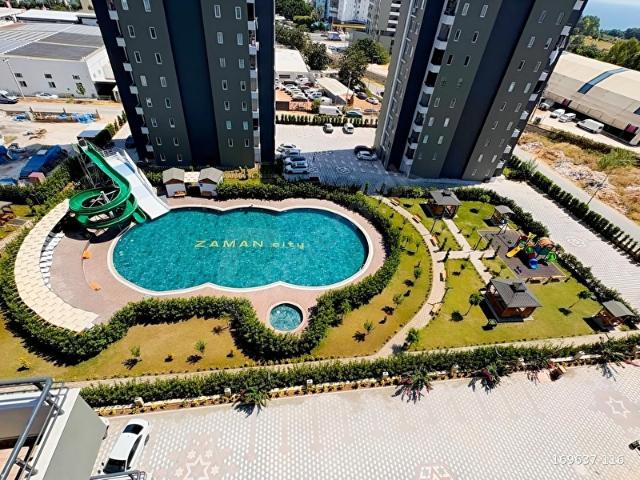 Mezitli Akdenizde Sosyal İmkanlı Havuzlu Lüks Sitede D.Gazlı 1+1