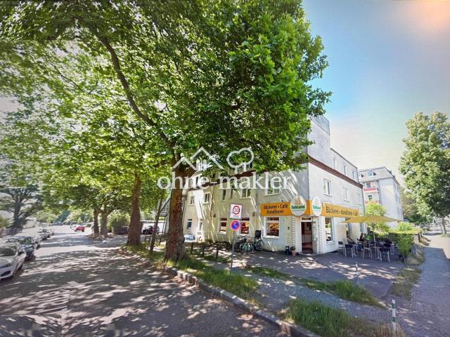 MFH 12 Wohnungen + großer Bauplatz von Privat