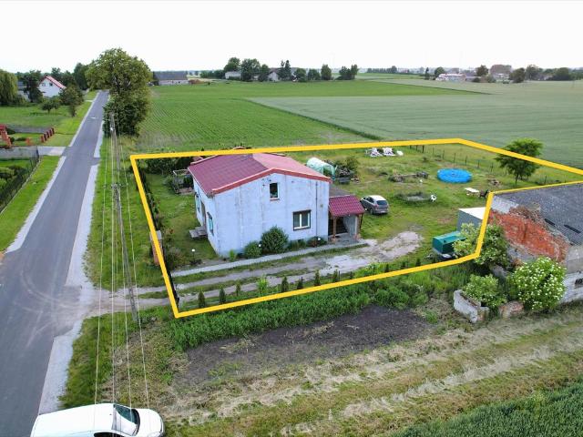 Dom z dużą działką i potencjałem inwestycyjnym