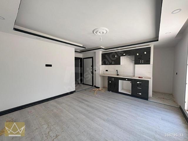 MİLAS GÜMÜŞLÜK 1+1 BÜYÜK BALKONLU YERDEN ISITMALI SIFIR DAİRE