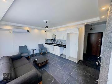 MİNE EMLAKTAN HAVUZLU VE FUL EŞYALI 1+1 SATILIK DAİRE