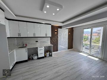MİNE EMLAKTAN KARAÇALI MAHALLESİNDE HAVUZLU 1+1 DAİRE