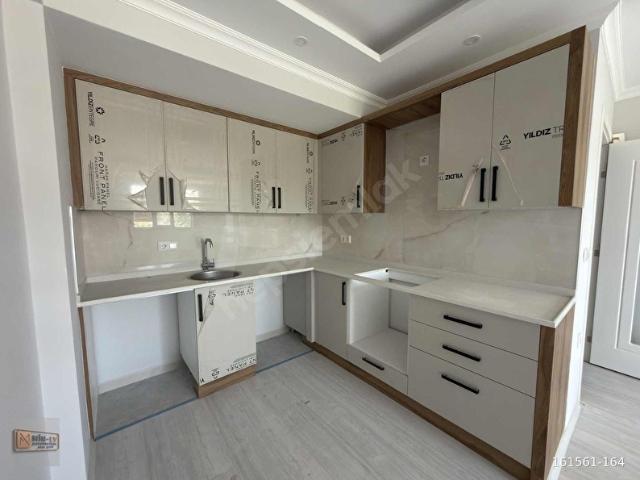 MİNEV Karaçalı'da Asansörlü Ara Kat 1+1 Daire