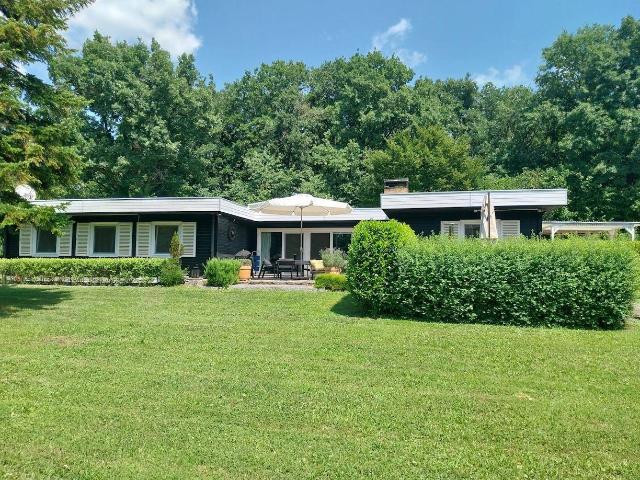 Mid Century Bungalow in sonniger Grünruhelage auf einem Pachtgrund