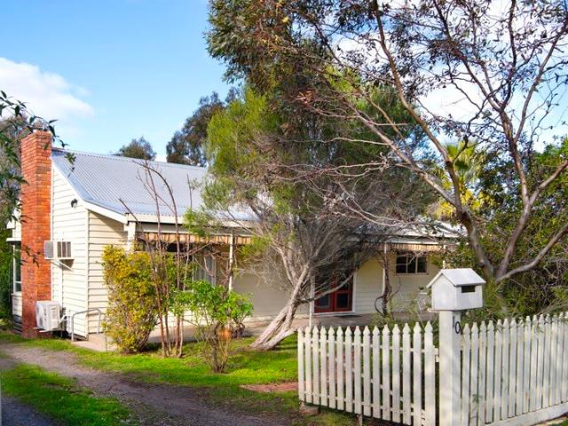 Mid century charm and timeless appeal offers a home with soul