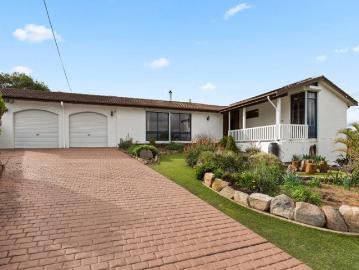 Mid Century Charm, Elevated into a Poolside Entertainer