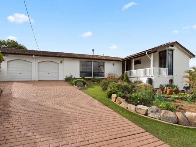 Mid Century Charm, Elevated into a Poolside Entertainer