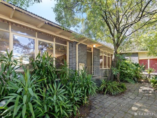 Mid century home with immense potential