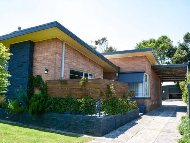 MID CENTURY MODERN GEM IN THE MOST SOUGHT AFTER TOWNSHIP LOCATION