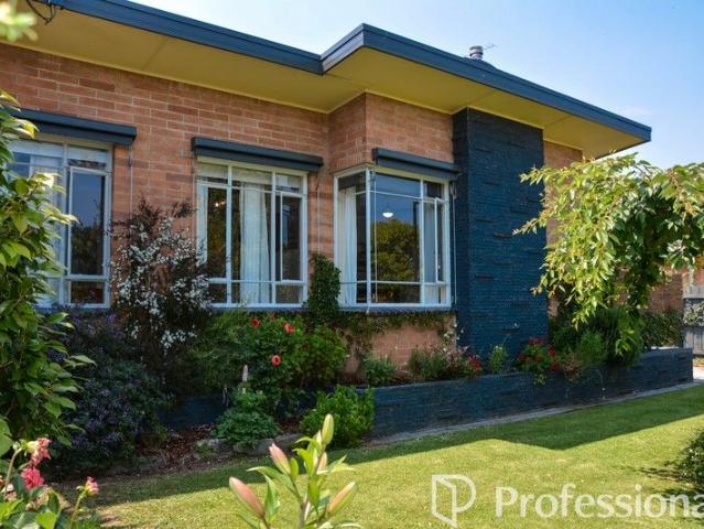 MID CENTURY MODERN GEM IN THE MOST SOUGHT AFTER TOWNSHIP LOCATION