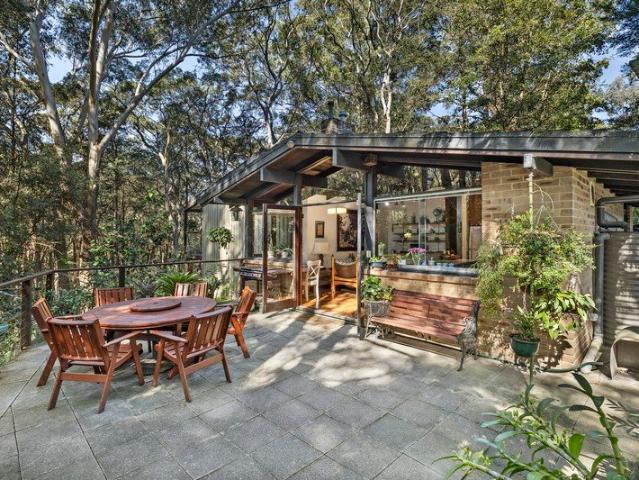 Mid Century Modernist Retreat in a Coveted Parkland Location