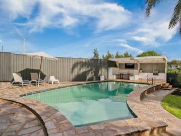 Mid century soul, spectacular views, and resort style family living